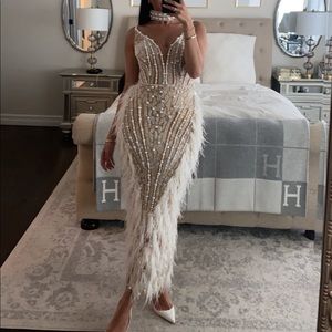 Vlora and Kaltrina pearl and feather gown